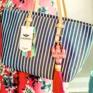 Consuela “Meg” East West Tote